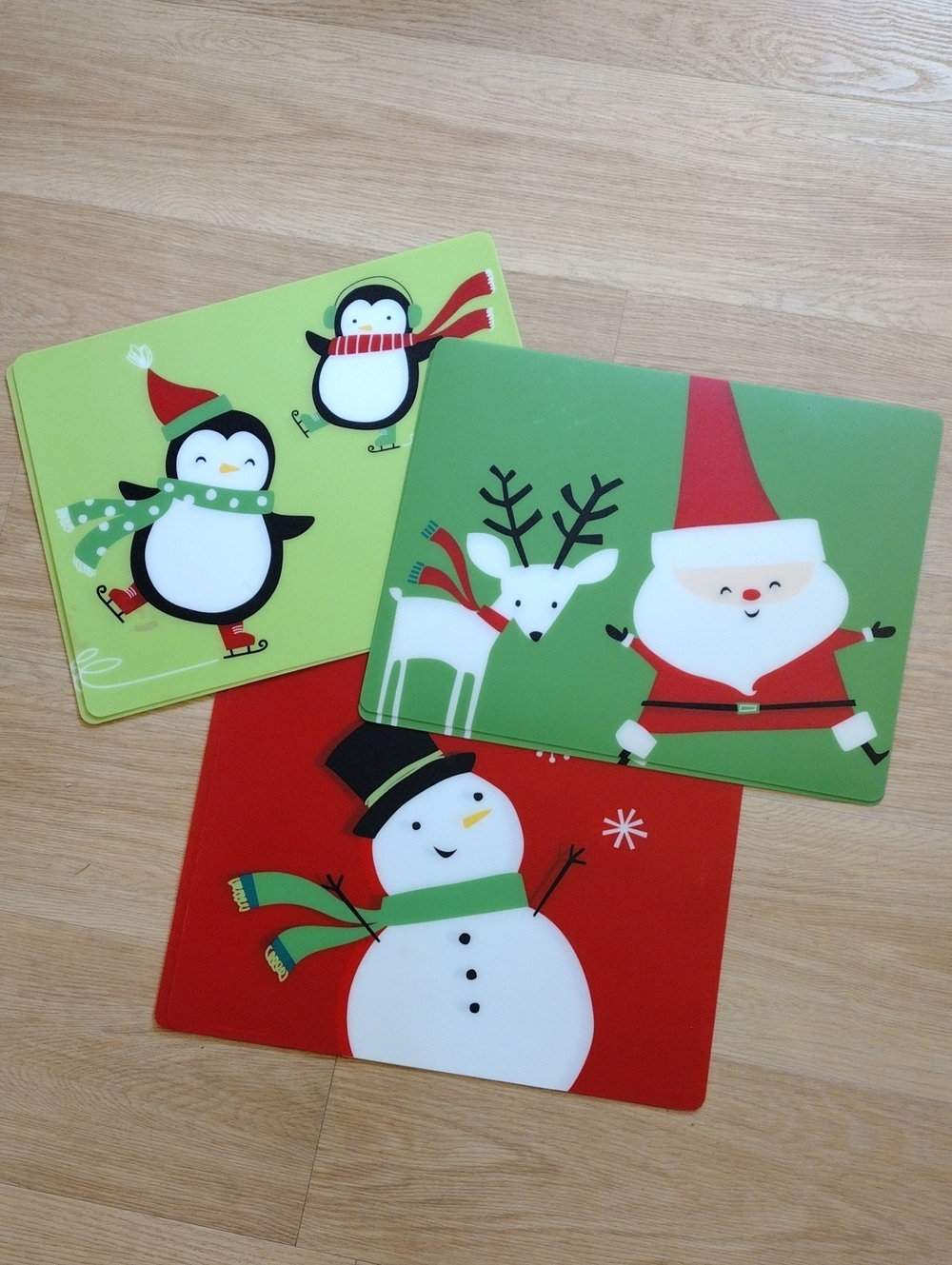 Target 2011 Christmas Holiday Placemats Set of 6 Santa Snowman Penguin 14 x 18